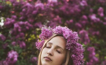Zelenooka vila charming woman with wreath on head and closed eyes