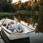 Love couple lying in a boat and dreaming