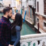 Loving couple on the one of bridge