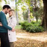 Loving couple hugging in park