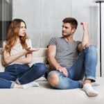 Offended displeased young loving couple