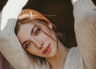 Kletva woman wearing gray v neck top