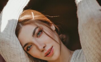 Kletva woman wearing gray v neck top