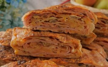 Recept za najsočniju pica pitu od gotovih kora: Ukusna večera gotov za manje od sat vremena Recept za najsočniju pica pitu od gotovih kora: Ukusna večera gotov za manje od sat vremena